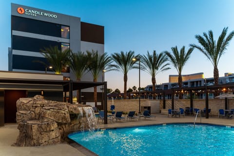 Outdoor pool, open 8:00 AM to 10:00 PM, sun loungers