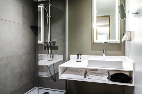 Eco-friendly toiletries, hair dryer, towels