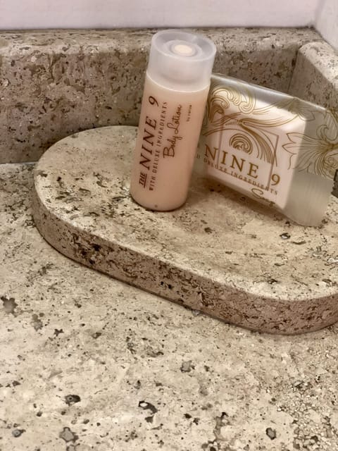 Shower, free toiletries, towels, soap