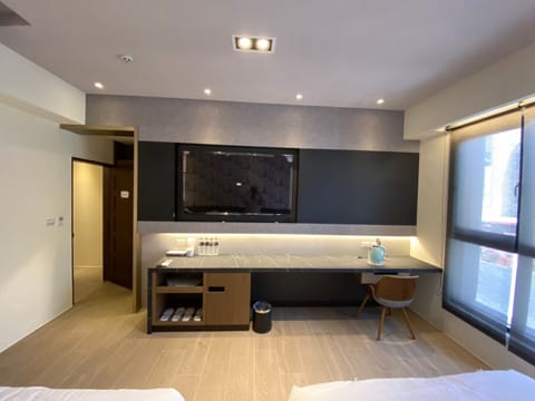Elite Quadruple Room | Desk, laptop workspace, blackout drapes, soundproofing