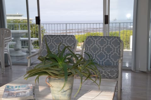 Cottage, Beachside | Living area | Flat-screen TV, DVD player