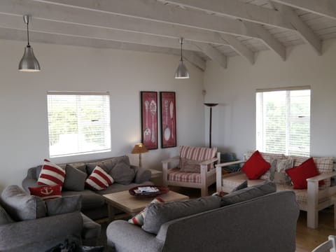 Cottage, Beachside | Living area | Flat-screen TV
