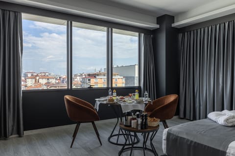 Premium bedding, minibar, in-room safe, laptop workspace