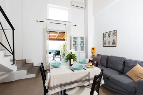 Family Apartment, 2 Bedrooms (TC5) | Living area | 32-inch TV with satellite channels, fireplace