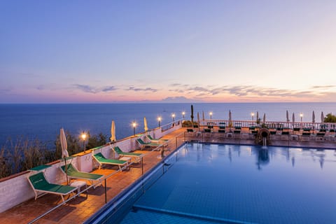 Indoor pool, seasonal outdoor pool, pool umbrellas, sun loungers