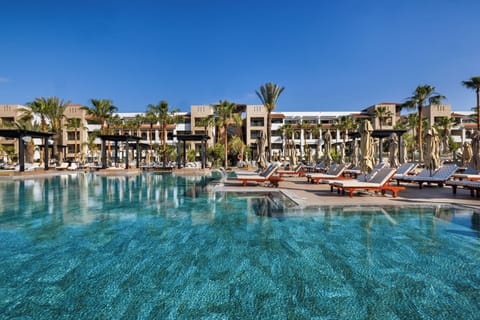 Indoor pool, outdoor pool, pool umbrellas, sun loungers