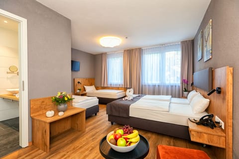 Quadruple Room | Egyptian cotton sheets, premium bedding, in-room safe, blackout drapes