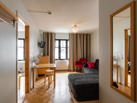 Apartment, 1 Bedroom | Iron/ironing board, free WiFi, bed sheets