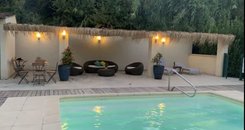 Seasonal outdoor pool, open 7:30 AM to 9:00 PM, pool umbrellas