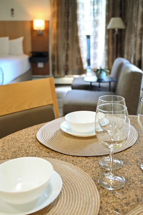 Two Queen Bed Apartment with Balcony | Private kitchen | Microwave, coffee/tea maker, electric kettle, toaster