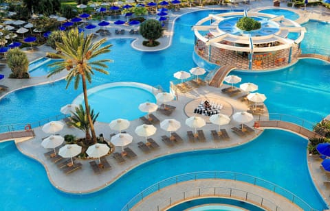 Indoor pool, outdoor pool, pool umbrellas, sun loungers