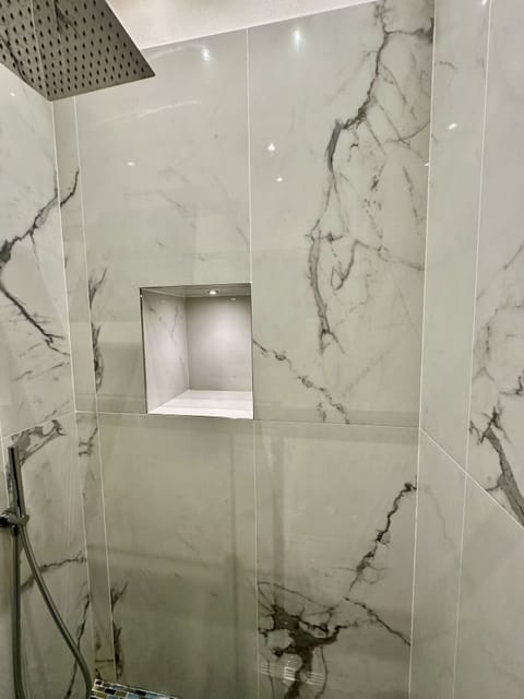 Premium Quadruple Room | Bathroom | Shower, rainfall showerhead, hair dryer, bidet