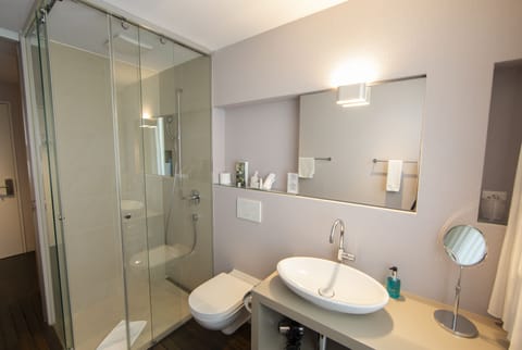 Shower, free toiletries, hair dryer, slippers