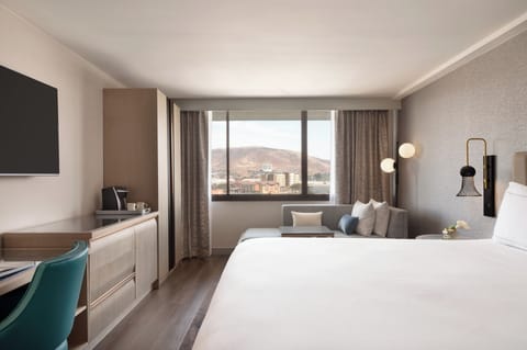 In-room safe, desk, laptop workspace, iron/ironing board