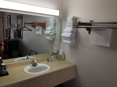 Classic Double Room, 2 Queen Beds | Bathroom | Hair dryer, towels, soap, shampoo