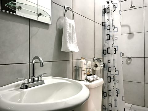 Standard Room | Bathroom | Shower, free toiletries, towels, soap