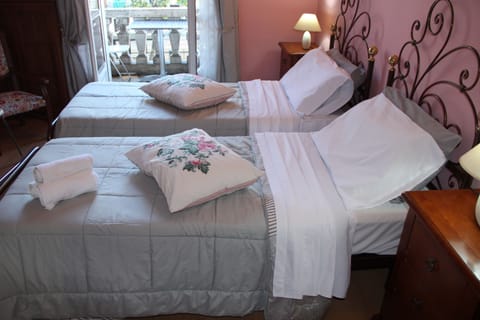 Double or Twin Room, Private Bathroom | Down comforters, memory foam beds, minibar, desk