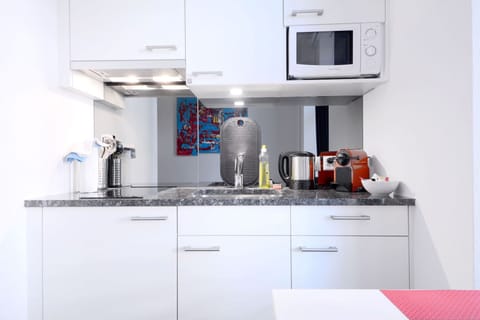 Studio, Kitchen | Private kitchen | Microwave, coffee/tea maker, highchair, cookware/dishes/utensils