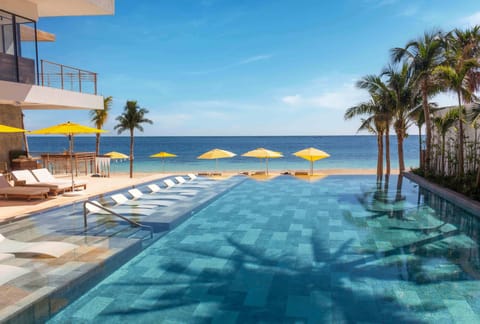 2 outdoor pools, open 7:00 AM to 7:00 PM, pool umbrellas, sun loungers