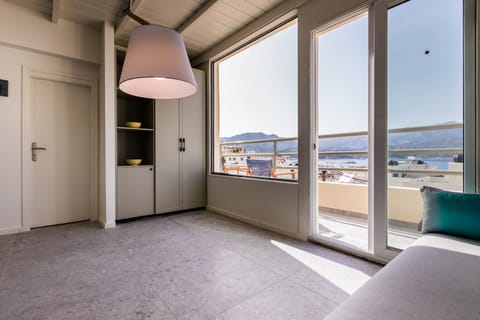 Penthouse, Balcony, Harbor View | Living area | 42-inch flat-screen TV with satellite channels