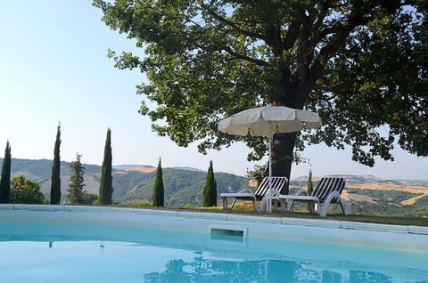 Seasonal outdoor pool, open 9:00 AM to 8:00 PM, sun loungers