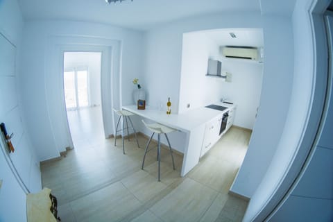 Executive Suite, Sea Facing | Private kitchenette | Electric kettle, highchair