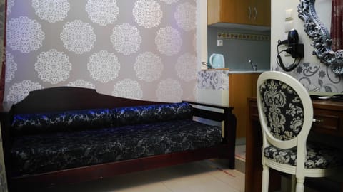 Standard Room, Sea View | Living area | Flat-screen TV