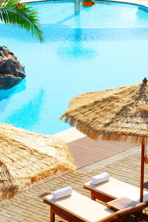 Indoor pool, 2 outdoor pools, pool umbrellas, sun loungers