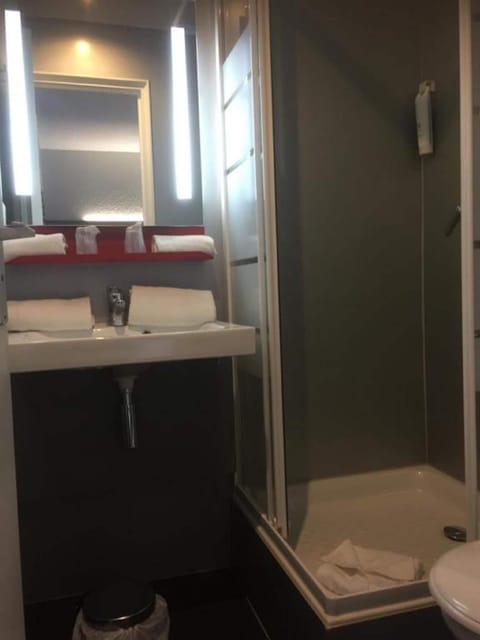 Shower, eco-friendly toiletries, hair dryer, towels