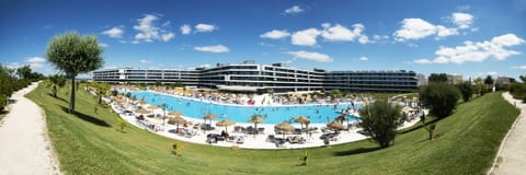Indoor pool, seasonal outdoor pool, pool umbrellas, sun loungers