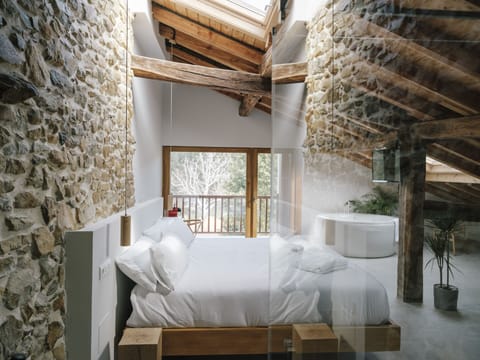 Eguzkia Double Room | Hypo-allergenic bedding, down comforters, memory foam beds, in-room safe