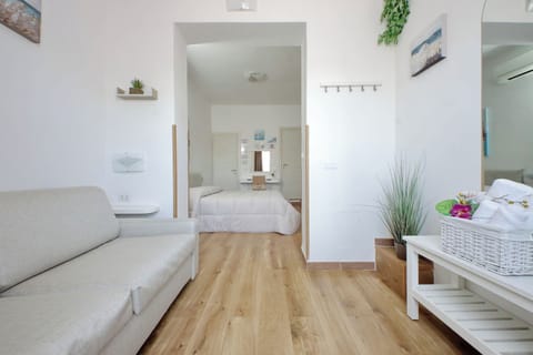Family Quadruple Room | Premium bedding, individually decorated, individually furnished, desk