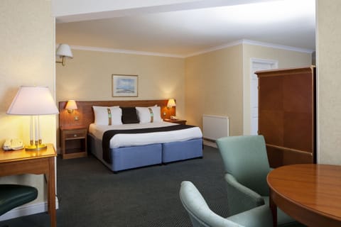 Suite, 1 King Bed | Minibar, in-room safe, desk, iron/ironing board