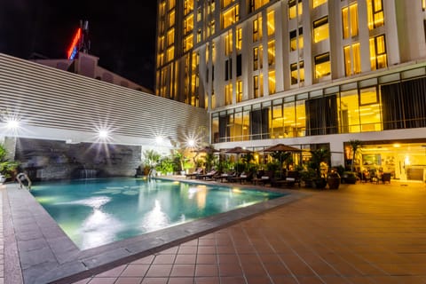 Outdoor pool, open 6:00 AM to 10:00 PM, pool umbrellas, sun loungers