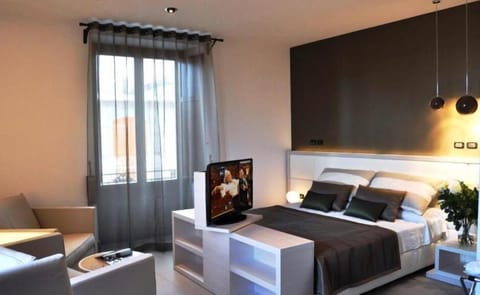Egyptian cotton sheets, down comforters, memory foam beds, minibar