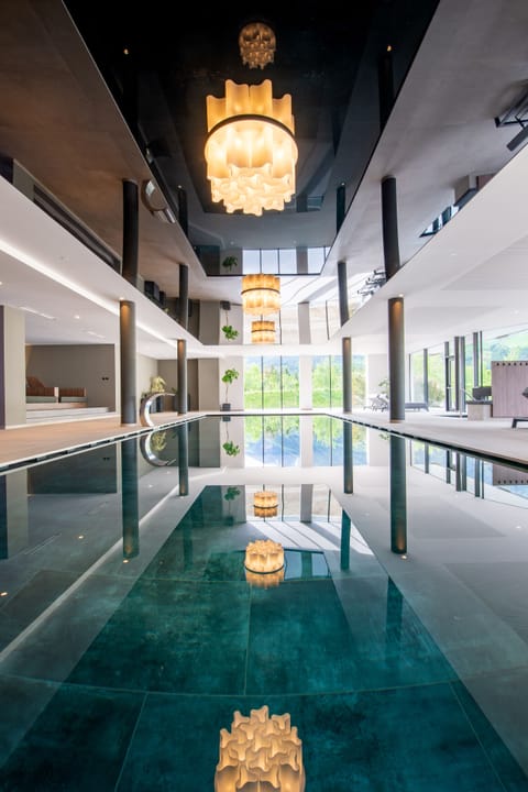 Indoor pool, outdoor pool, pool umbrellas, sun loungers