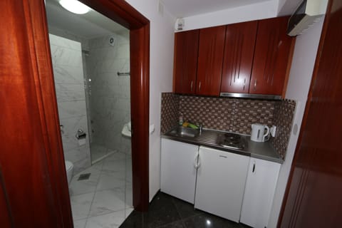 Desk, blackout drapes, soundproofing, free cribs/infant beds