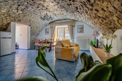 Apartment, 2 Bedrooms, Patio, Sea View | Living area | 32-inch flat-screen TV with digital channels, TV