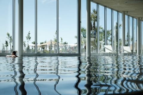 2 indoor pools, seasonal outdoor pool, sun loungers, lifeguards on site