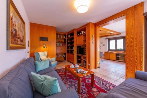Family Apartment, 2 Bedrooms, 2 Bathrooms (Casa Bader) | Living area | 24-inch flat-screen TV with satellite channels, TV, fireplace