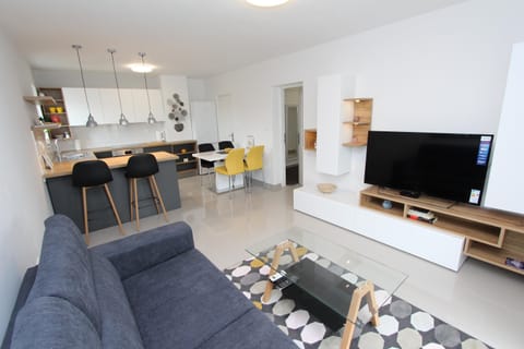 Apartment, 2 Bedrooms | Living area | Flat-screen TV