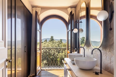 Designer toiletries, hair dryer, bathrobes, slippers