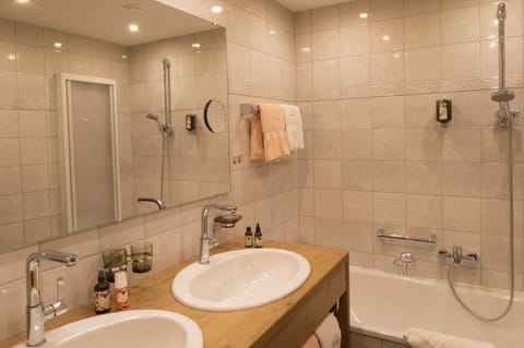 Combined shower/tub, free toiletries, hair dryer, bathrobes