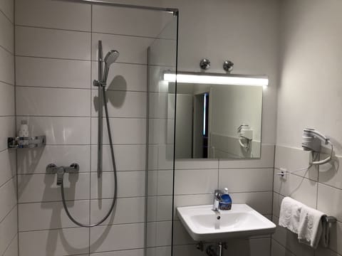 Shower, free toiletries, hair dryer, towels