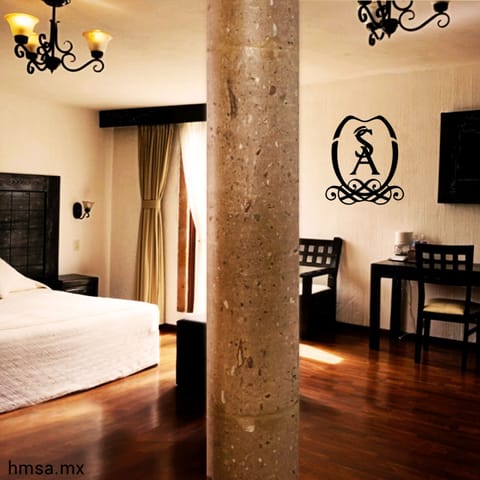 Suite | Individually furnished, desk, laptop workspace, blackout drapes