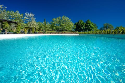 2 outdoor pools, open 9:00 AM to 6:00 PM, sun loungers