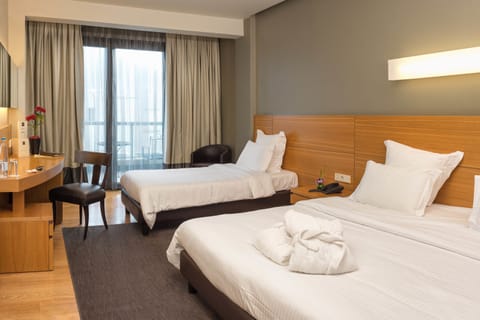 Triple Room | Premium bedding, down comforters, in-room safe, desk