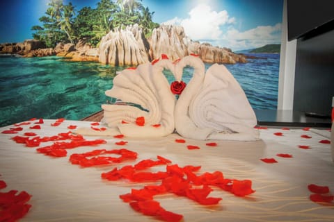 Pillowtop beds, desk, laptop workspace, blackout drapes