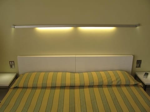 Family Room | Premium bedding, down comforters, minibar, individually decorated