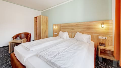 Comfort Double Room | Hypo-allergenic bedding, in-room safe, desk, blackout drapes